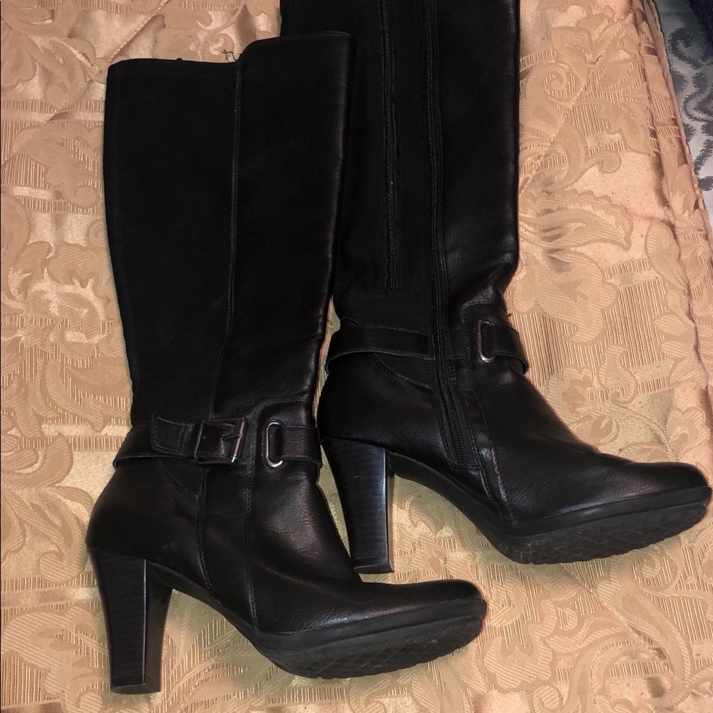 Aerosols boots. Black heels. Silver buckle detail.